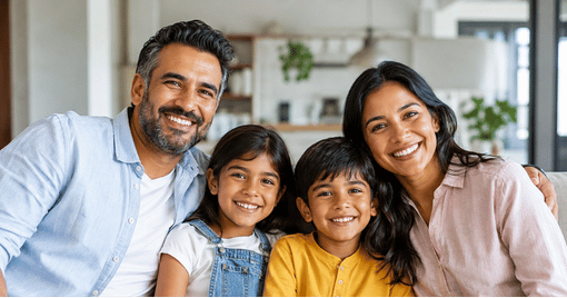 Smiling family spending time together at home